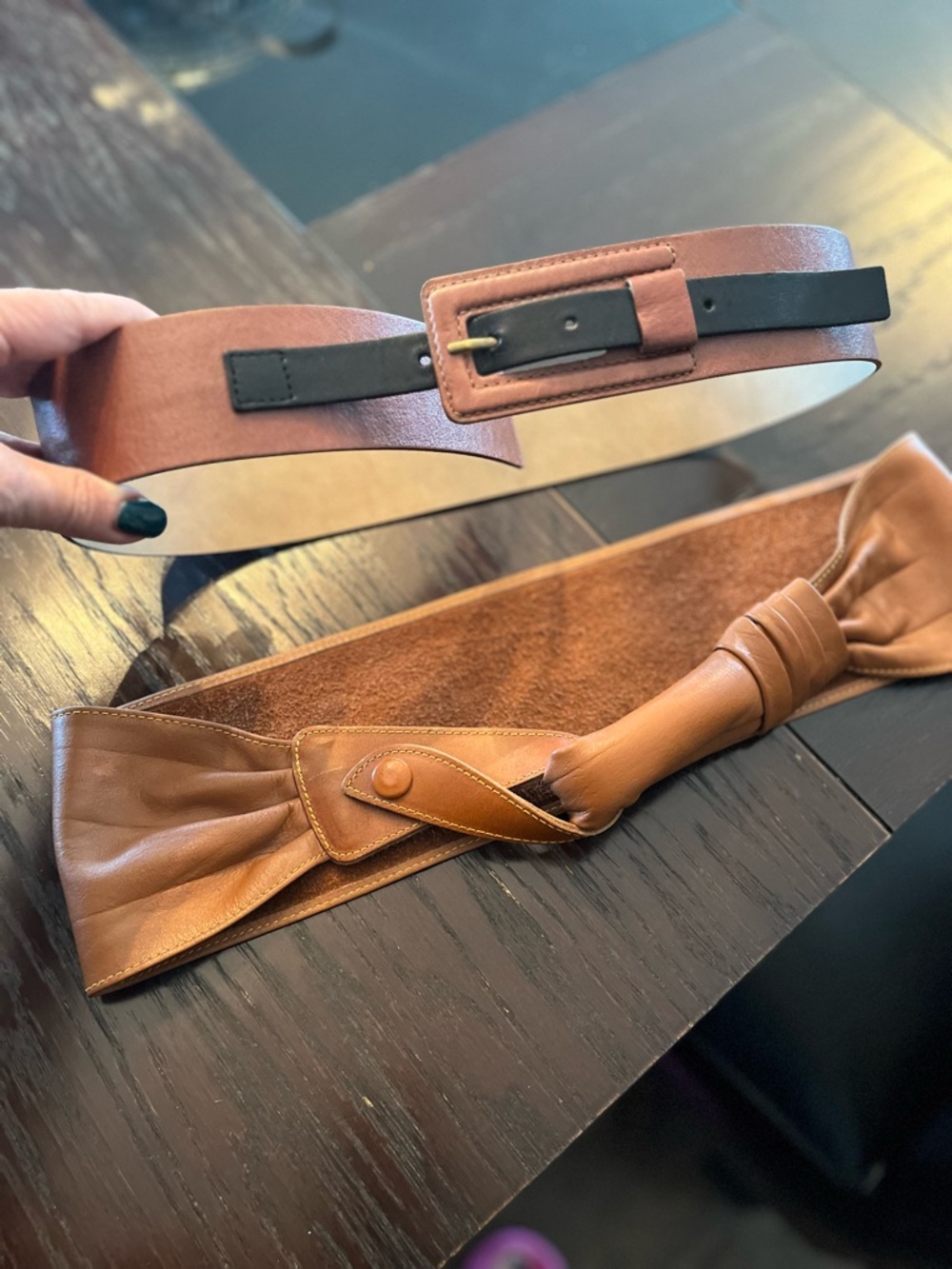 2 tan leather belts
